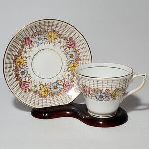 Rosina Teacup and Saucer Floral Basket Weave Pink Blue Flowers Vintage
